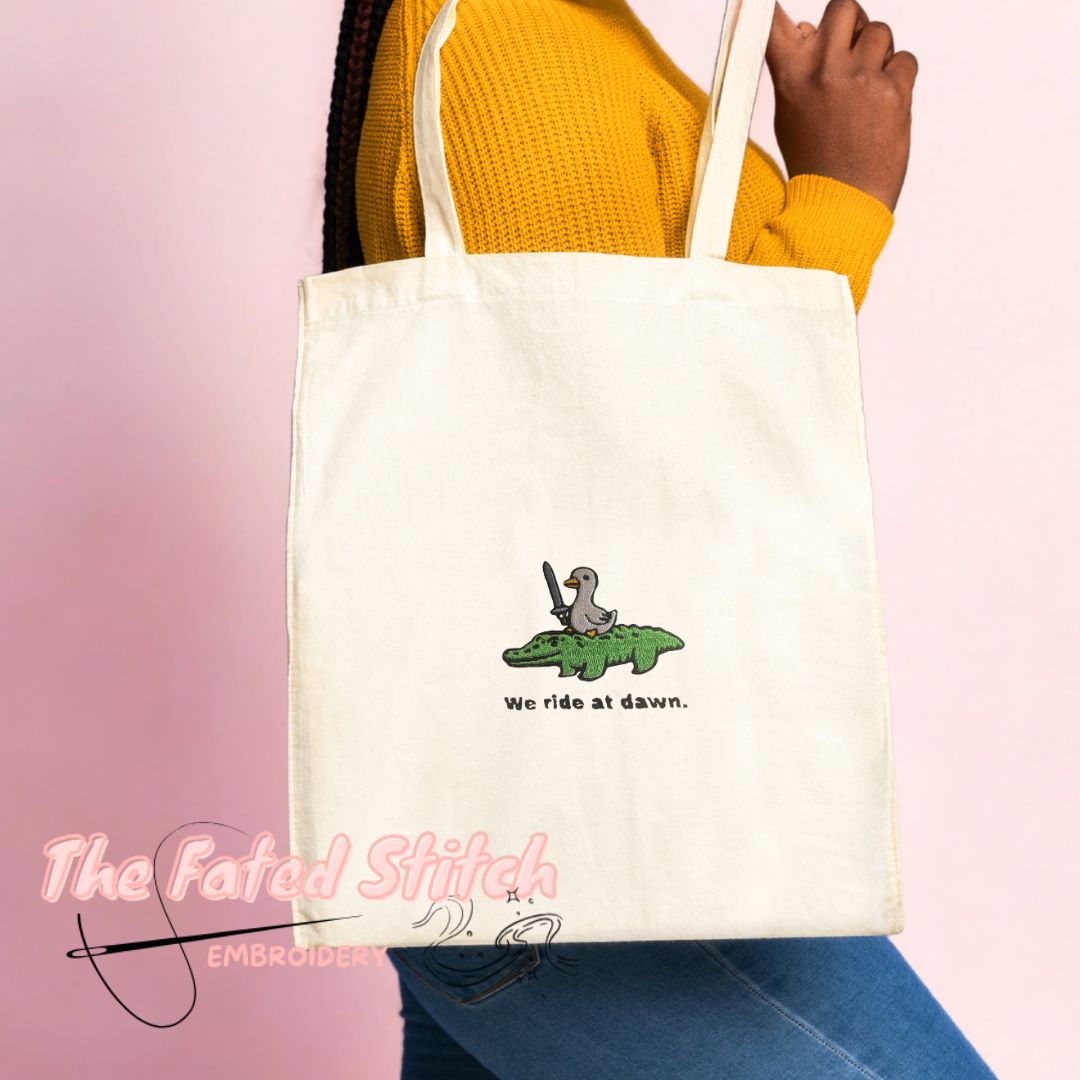 Goose riding a Crocodile - "We ride at dawn" - Natural Cotton Tote Bag
