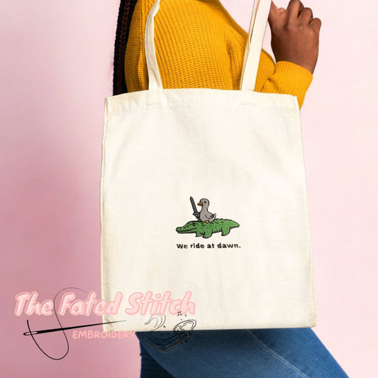 Goose riding a Crocodile - "We ride at dawn" - Natural Cotton Tote Bag