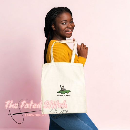 Goose riding a Crocodile - "We ride at dawn" - Natural Cotton Tote Bag